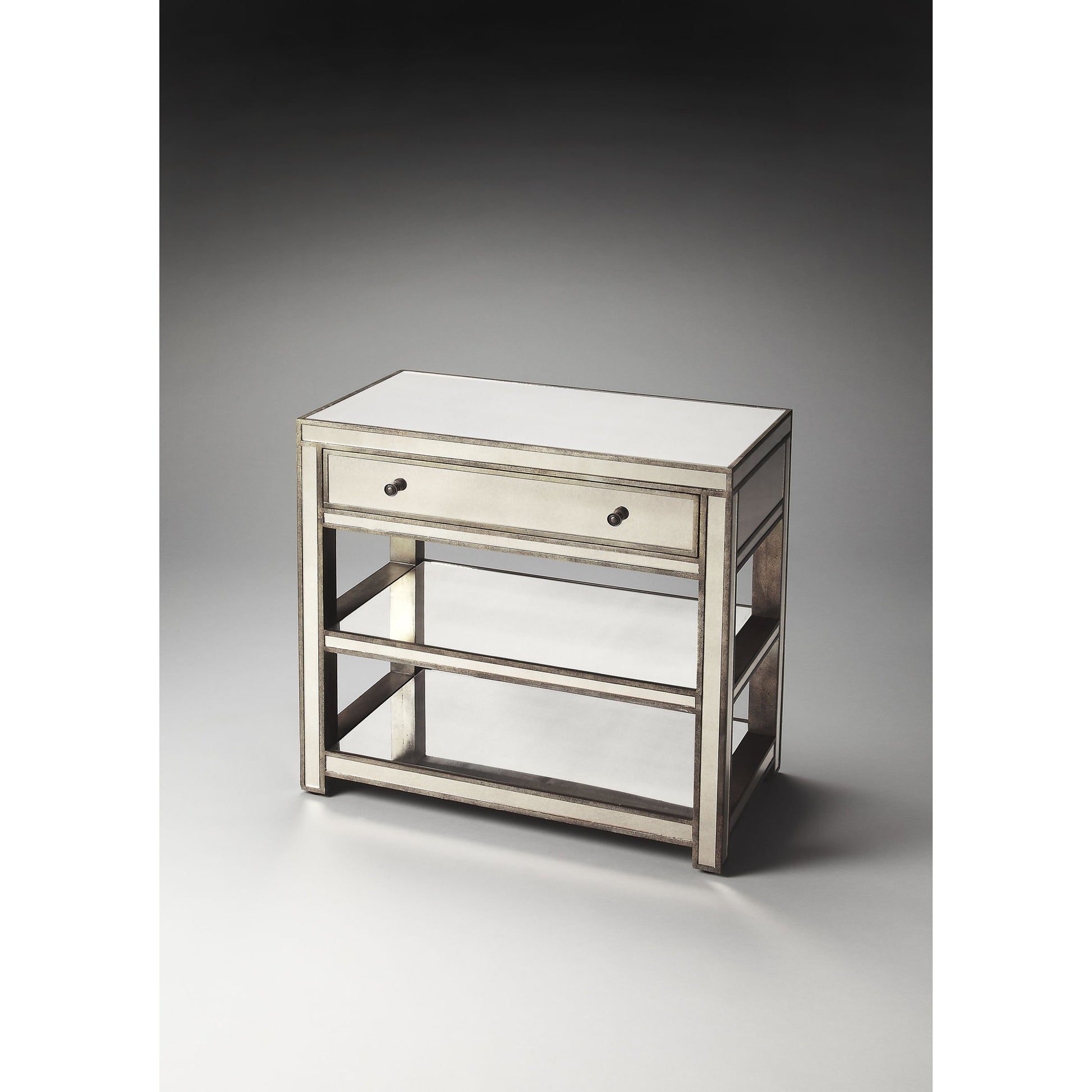Miranda Mirrored Console Table by Butler Specialty Company in silver and mirror. Made from poplar solids, mdf in a modern style.