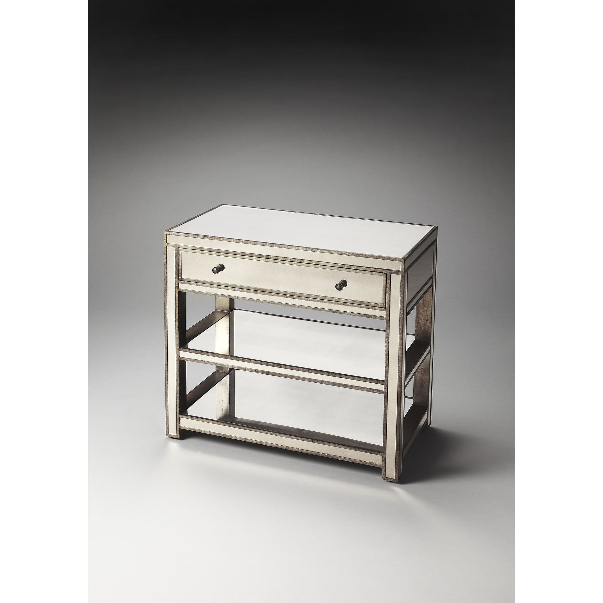 Miranda Mirrored Console Table by Butler Specialty Company in silver and mirror. Made from poplar solids, mdf in a modern style.