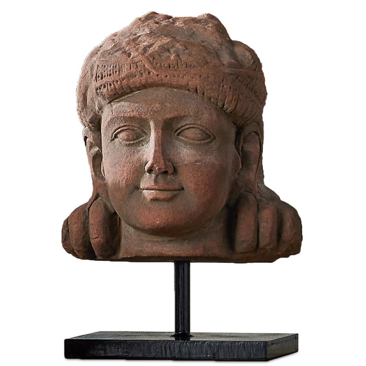 Mathura Head on Stand by Currey and Company in brick red, black. Made from stone, metal in a rustic style.