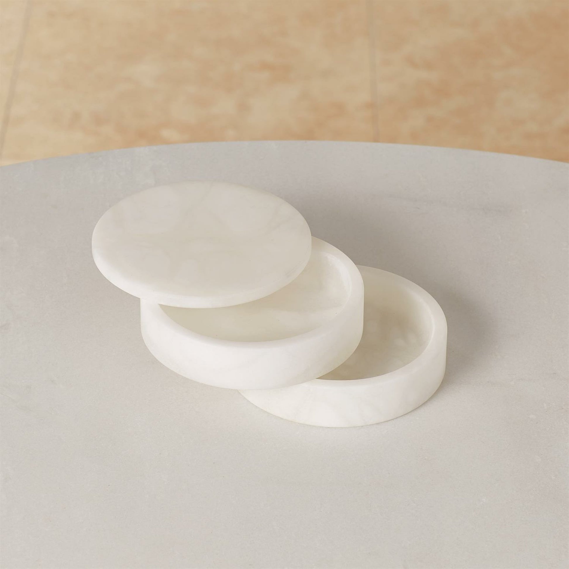 Alabaster Swivel Box by Global Views. Made from alabaster in a transitional style.