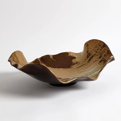 Wave Platter by Global Views. Made from ceramic in a eclectic & global style.