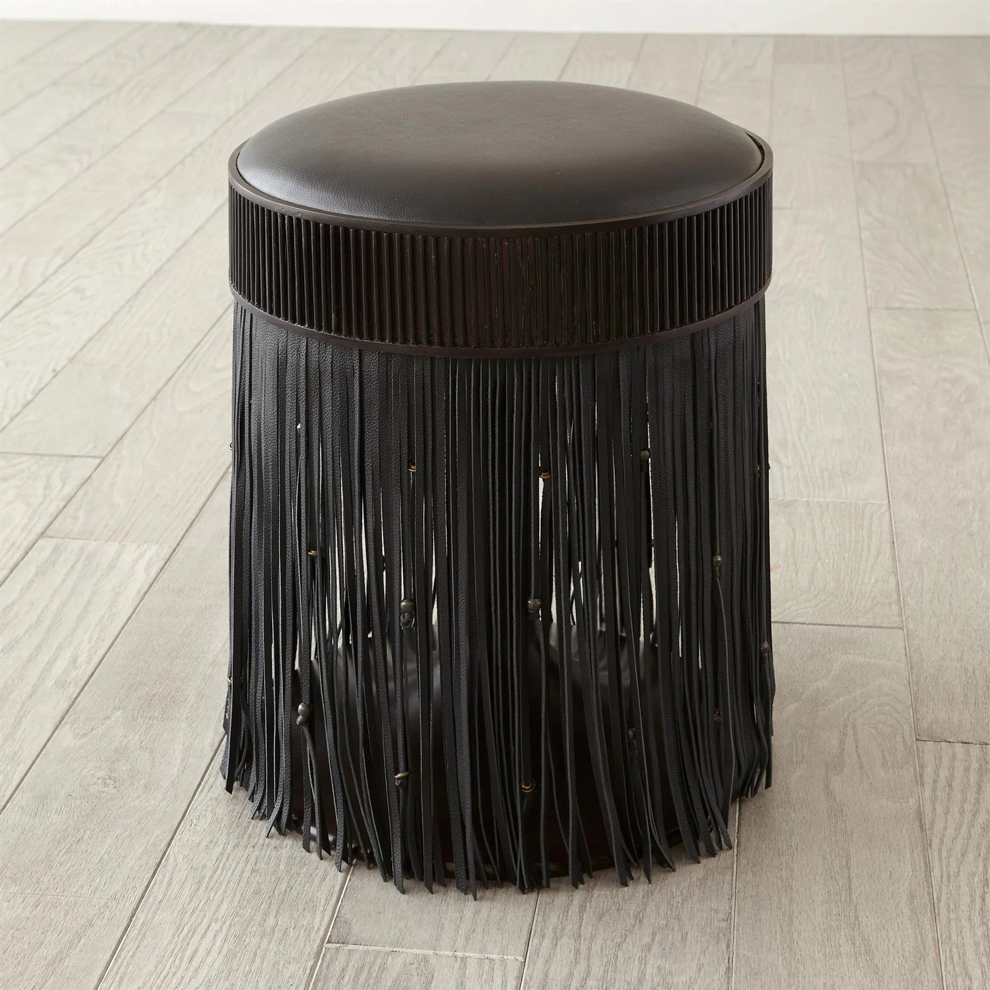 Grace Stool by Global Views in black. Made from brass, leather, mild steel in a eclectic & global style.