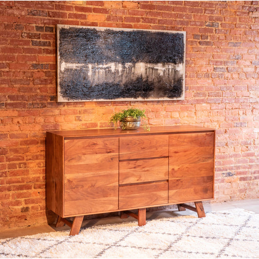 Stavanger Sideboard by World Interiors in browns and cinnamon brown. Made from acacia wood in a unique style.