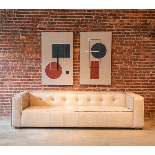 Portia Cream Leather Sofa by World Interiors in white and italian cream. Made from top grain leather in a unique style.