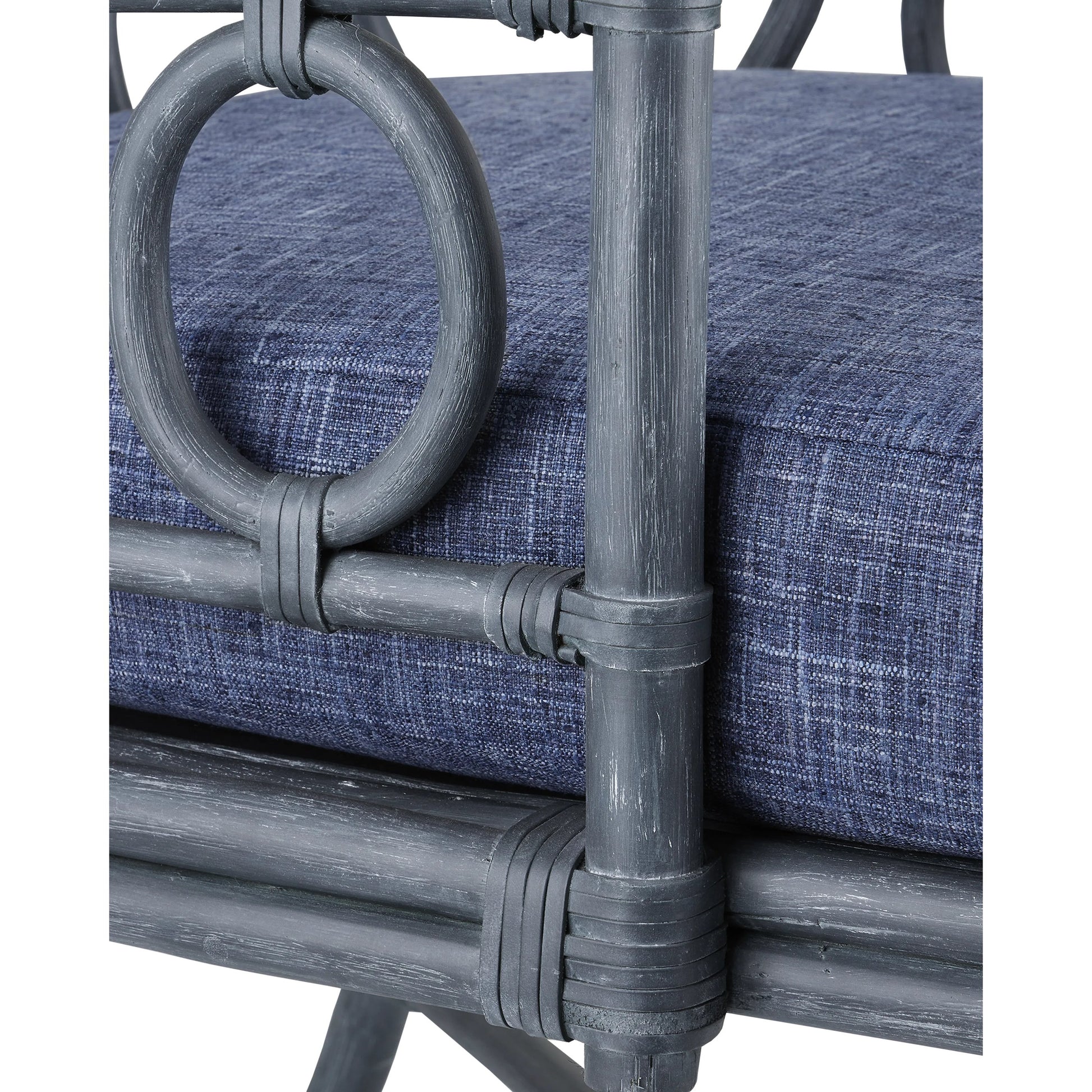 Tegal Chair by Currey and Company in vintage navy, indigo. Made from rattan, plywood, fabric, foam in a coastal style.