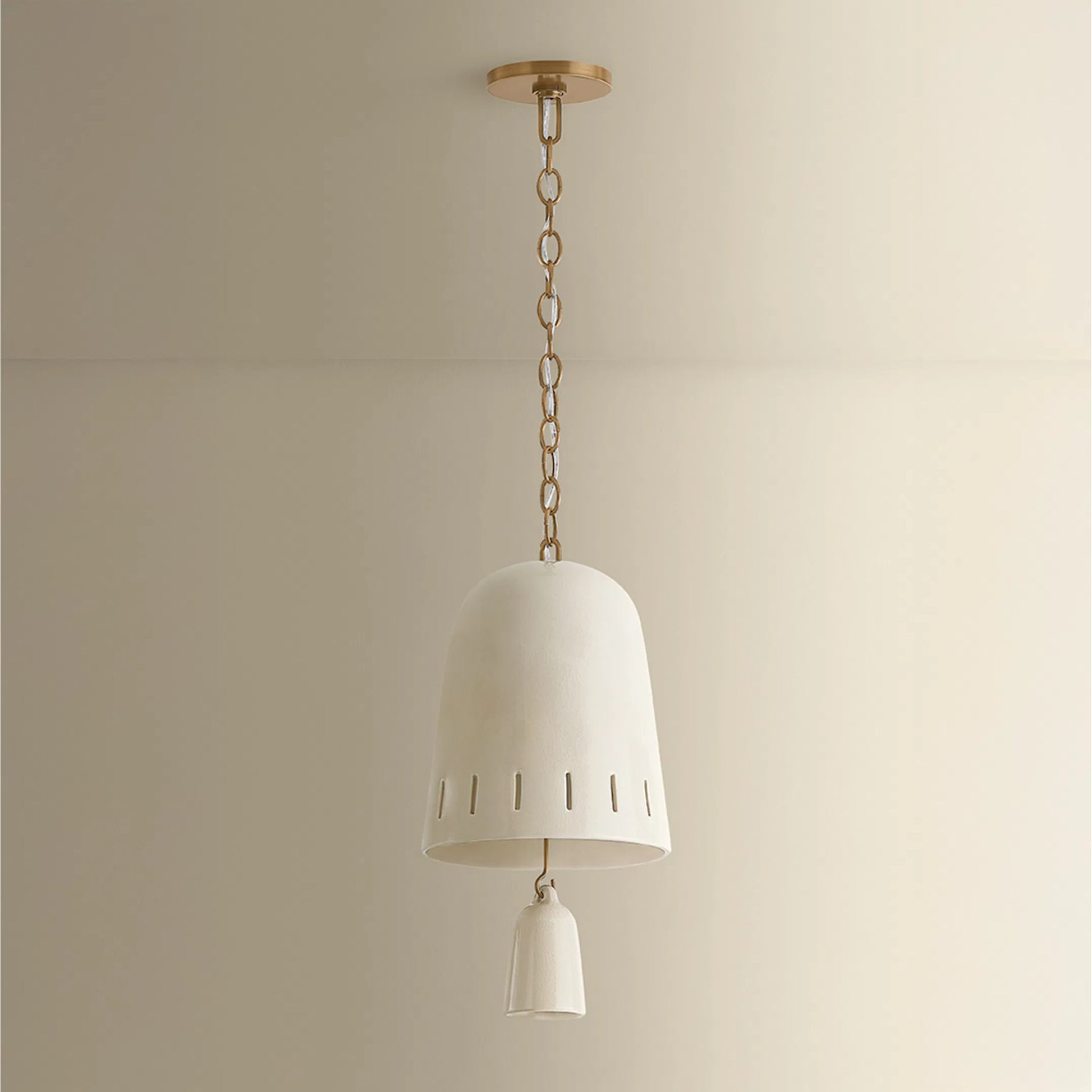 Omi Pendant by Hudson Valley in patina brass, ceramic ivory crackle. Made from ceramic in a unique style.