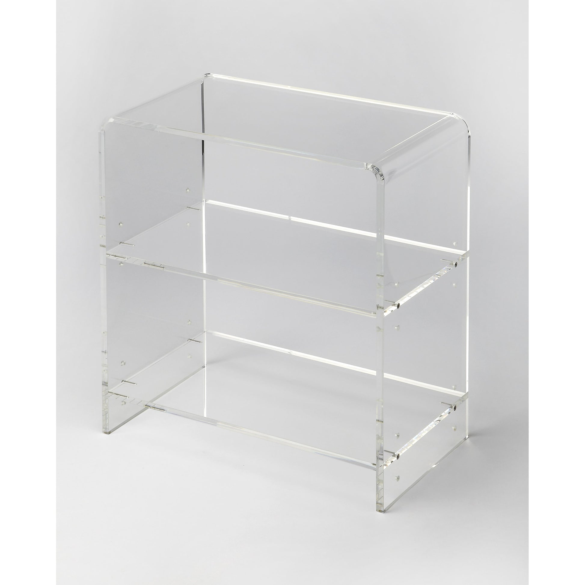 Crystal Clear Acrylic Bookcase by Butler Specialty Company in clear and clear acrylic. Made from acrylic clear t13 mm in a modern style.