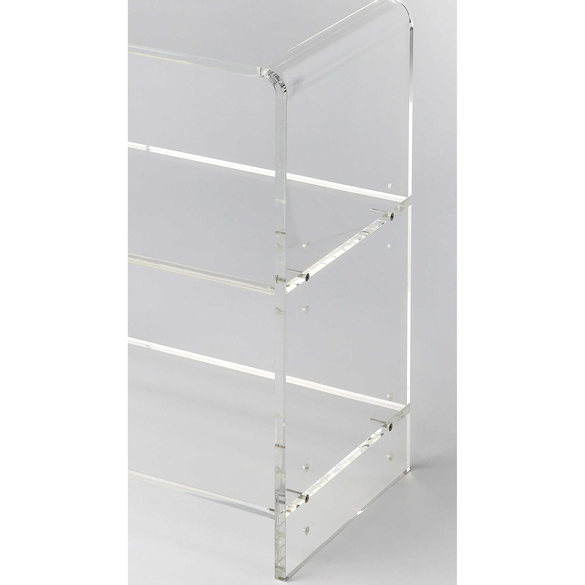 Crystal Clear Acrylic Bookcase by Butler Specialty Company in clear and clear acrylic. Made from acrylic clear t13 mm in a modern style.