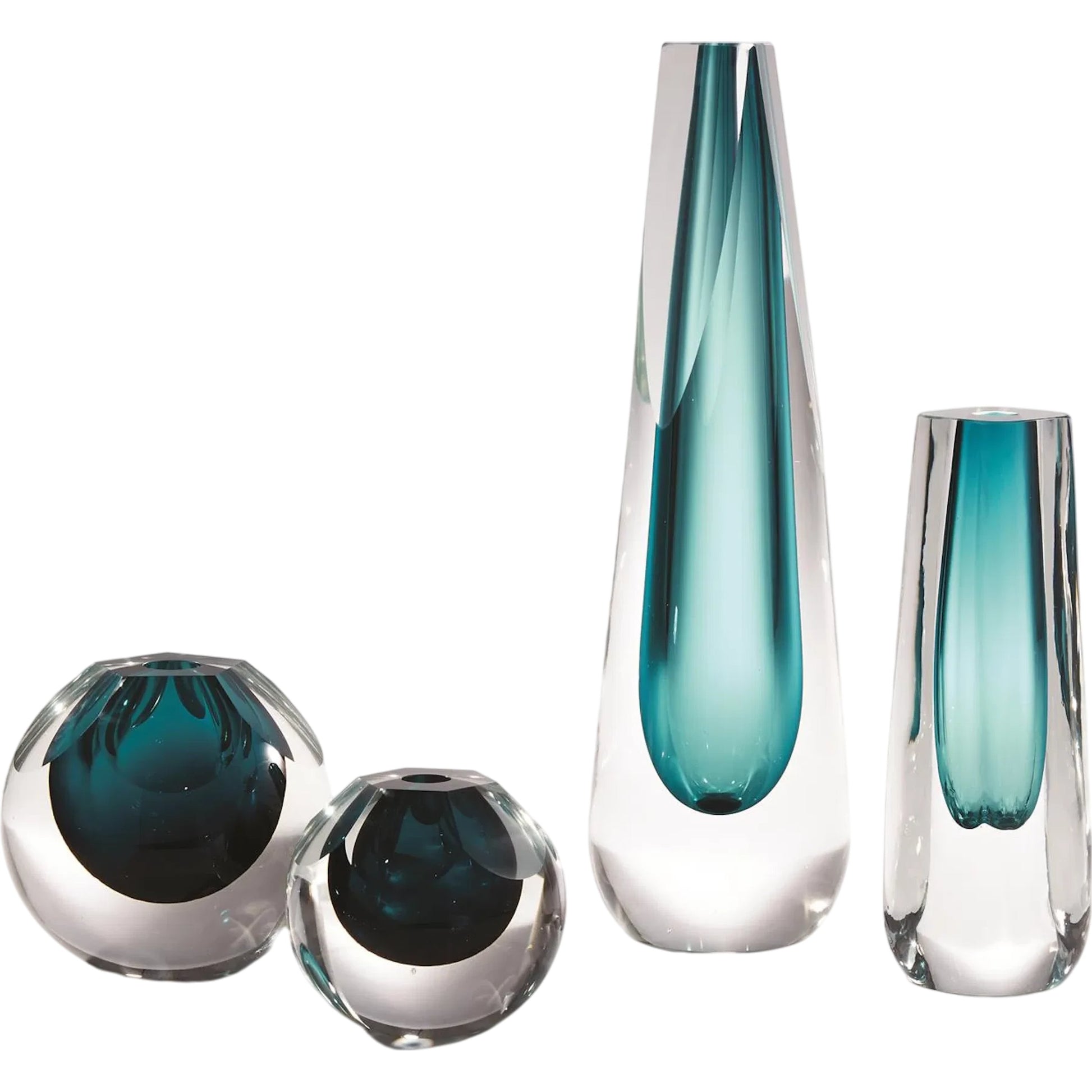 Hexagon Cut Glass Vase by Global Views. Made from art glass in a coastal style.