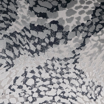 Flirty Pillow by DV Kap Home. Made from 84% polyester, 16% viscose in a modern style.