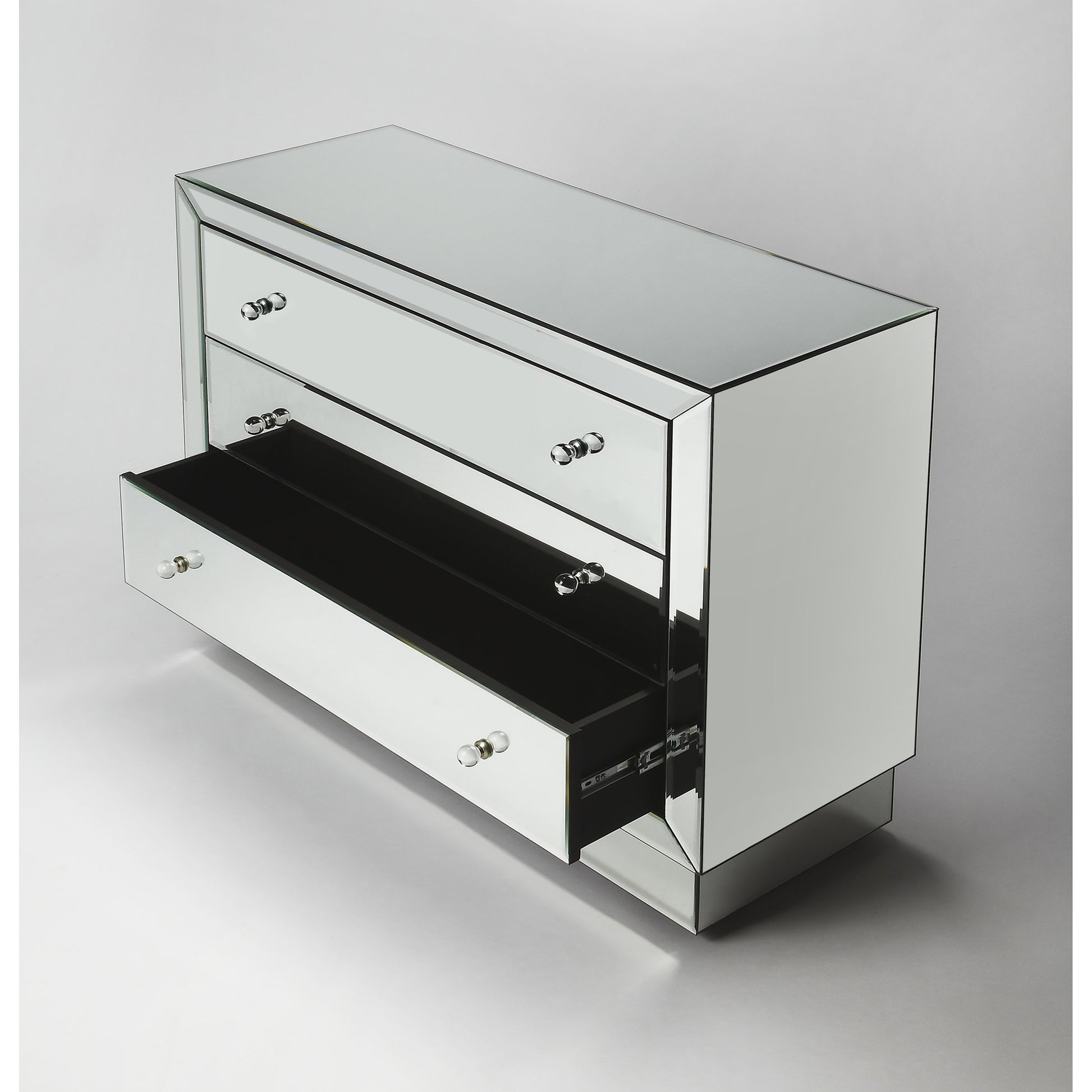 Emma Mirrored Chest by Butler Specialty Company in clear and mirror. Made from mirror, mdf in a transitional style.