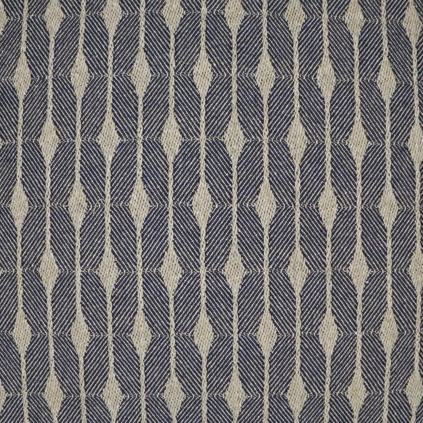 002 SI-2027961 | Closeup | Hugo Pillow by DV Kap Home in navy. Made from 60% post industrial cotton, 40% post industrial polyester in a modern style.