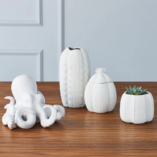 Octopus by Global Views. Made from ceramic in a coastal style.