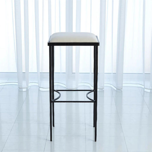 Hammered Bar Stool by Global Views. Made from iron in a modern style.