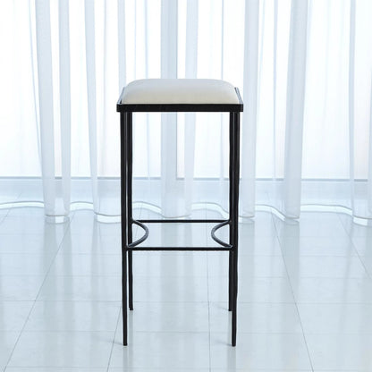 Hammered Counter Stool by Global Views in rustic gun metal powder coat. Made from iron in a transitional style.