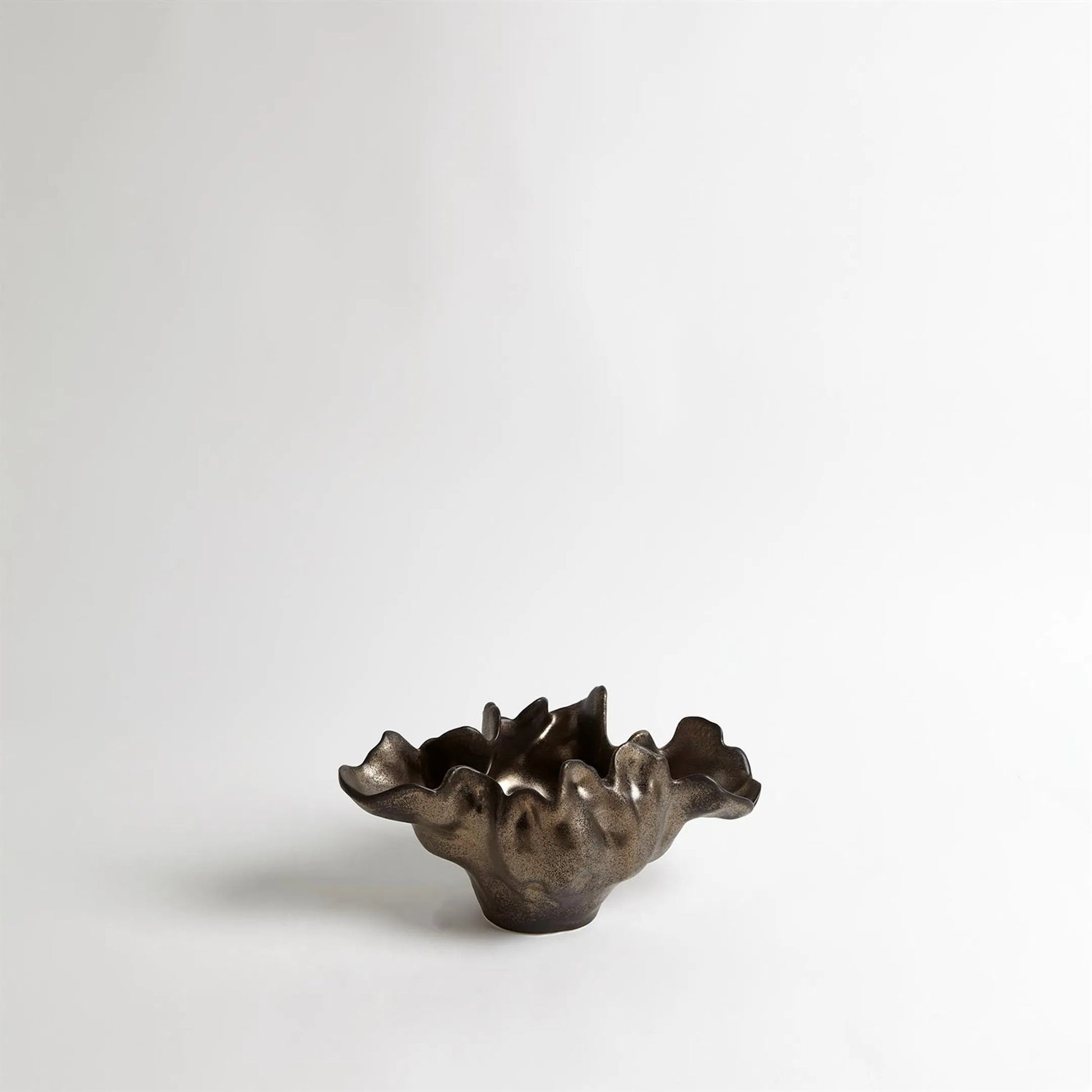 Meteor Bowl by Global Views. Made from ceramic in a coastal style.