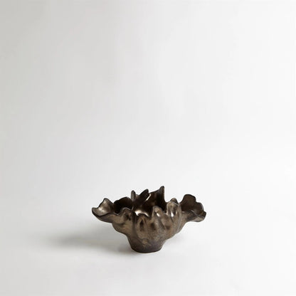 Meteor Bowl by Global Views. Made from ceramic in a coastal style.