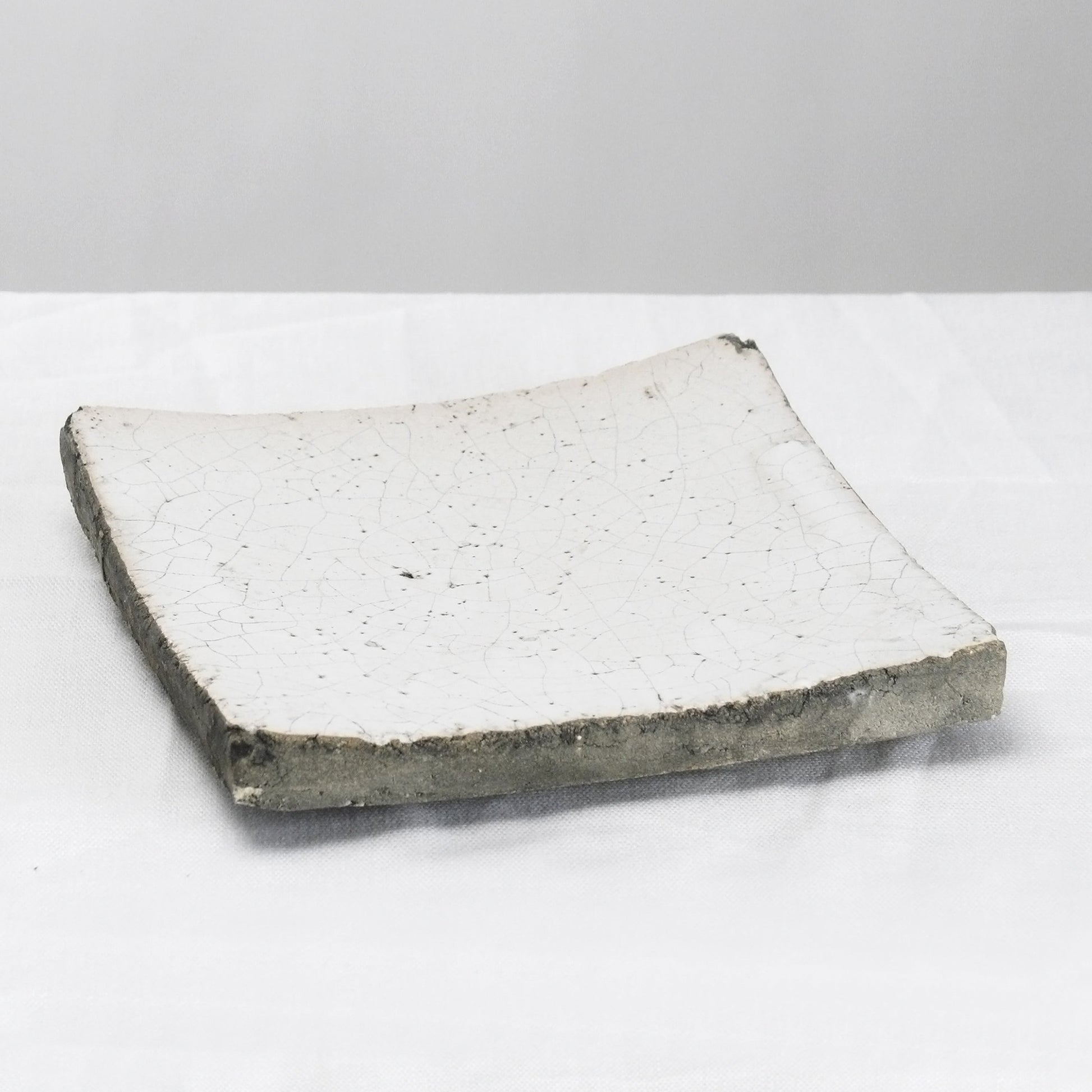 Decorative Dish by Zentique in distressed white and ceramic. Made from ceramic in a eclectic & global style.