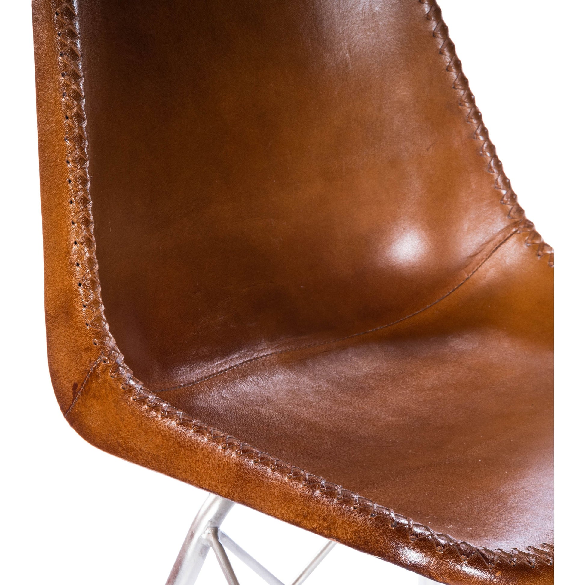 Inland Side Chair by Butler Specialty Company. Made from leather, iron in a traditional style.