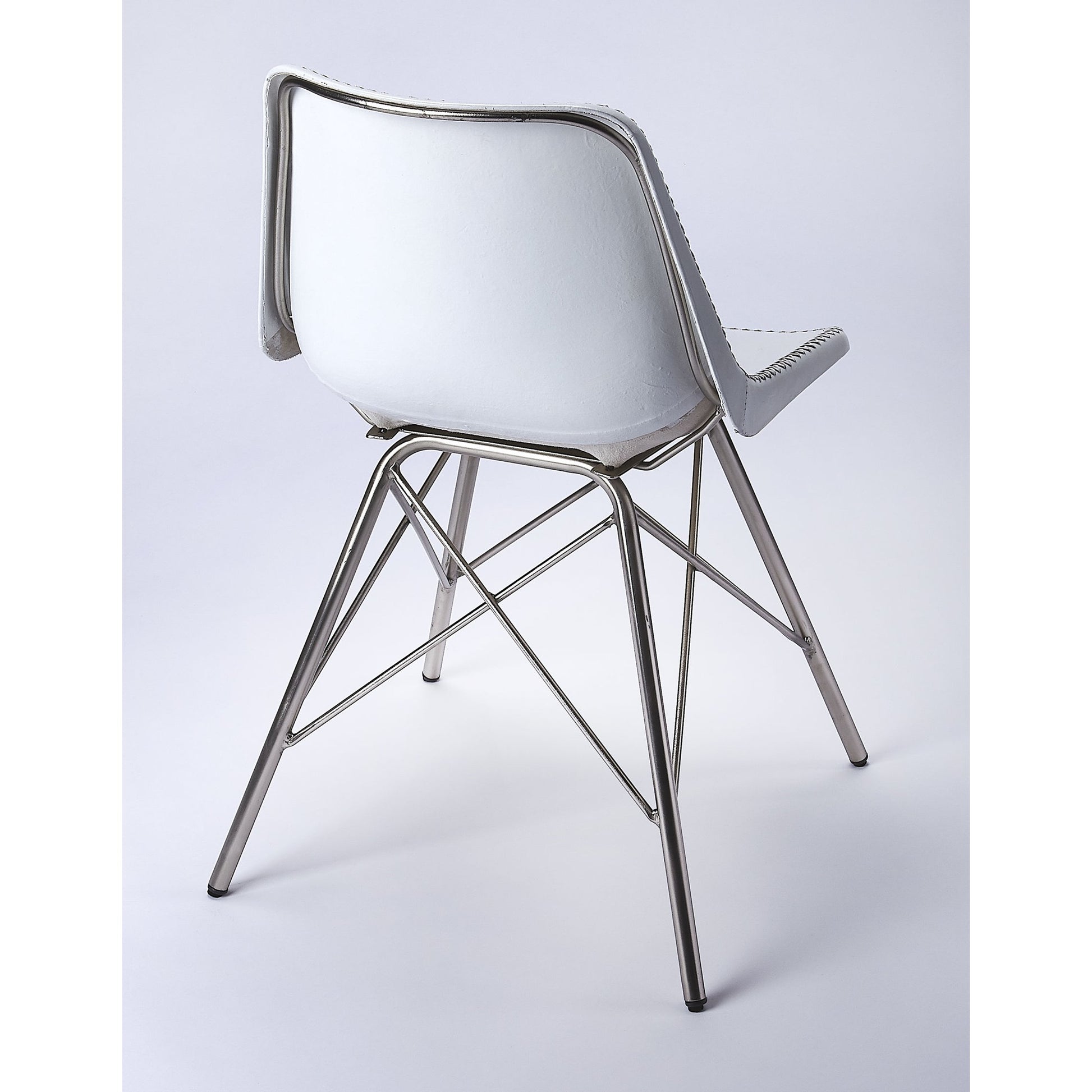 Inland Side Chair by Butler Specialty Company. Made from leather, iron in a traditional style.