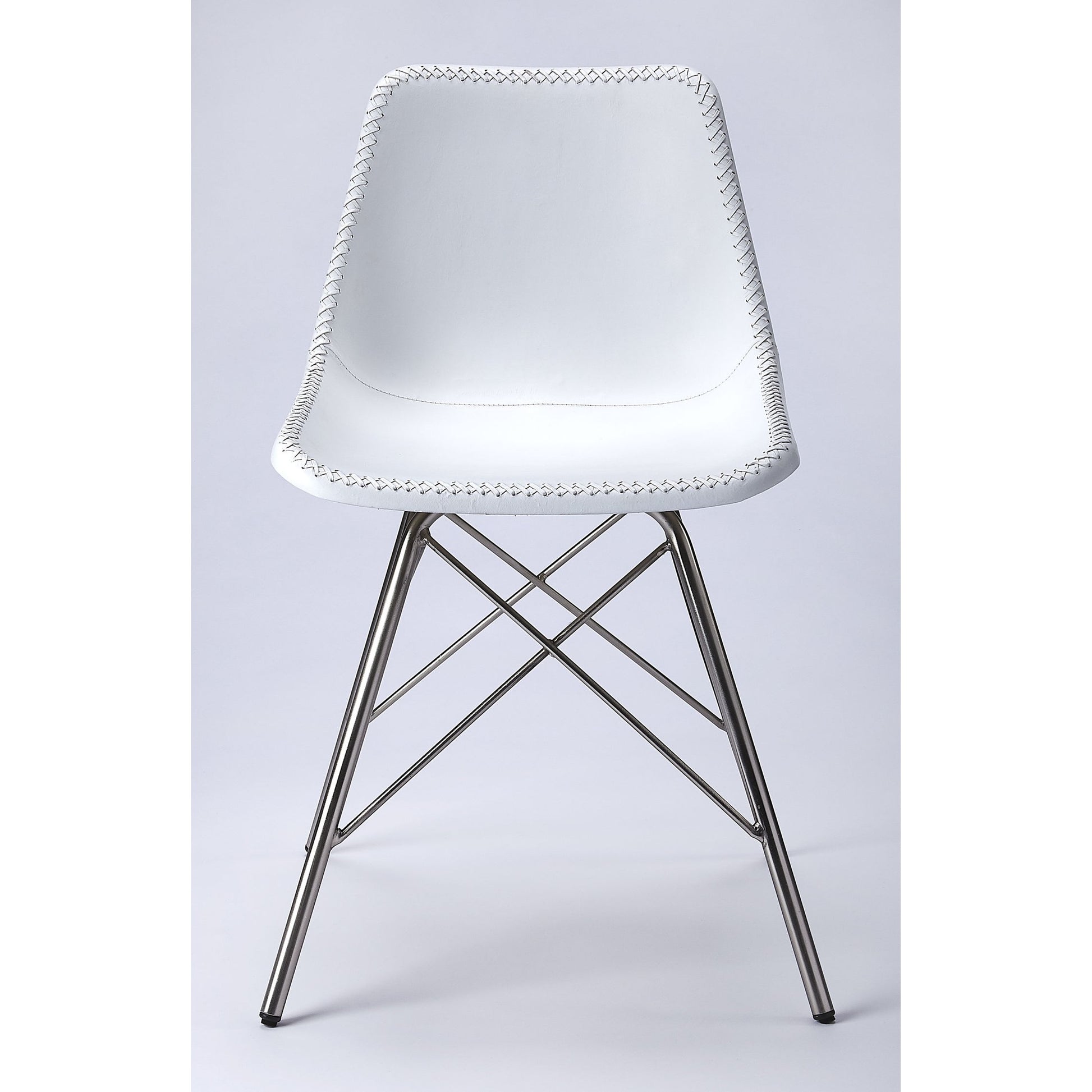 Inland Side Chair by Butler Specialty Company. Made from leather, iron in a traditional style.