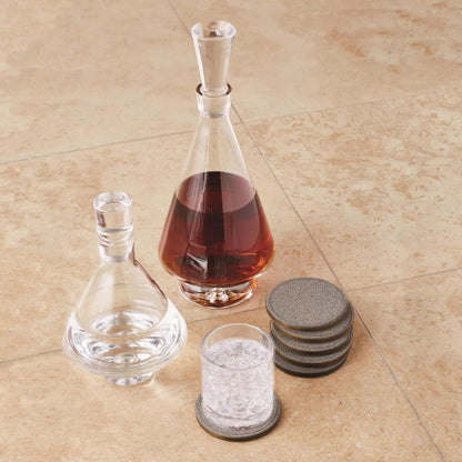 Alpen Coasters by Global Views. Made from mdf, brass, leather, polyester suede in a transitional style.
