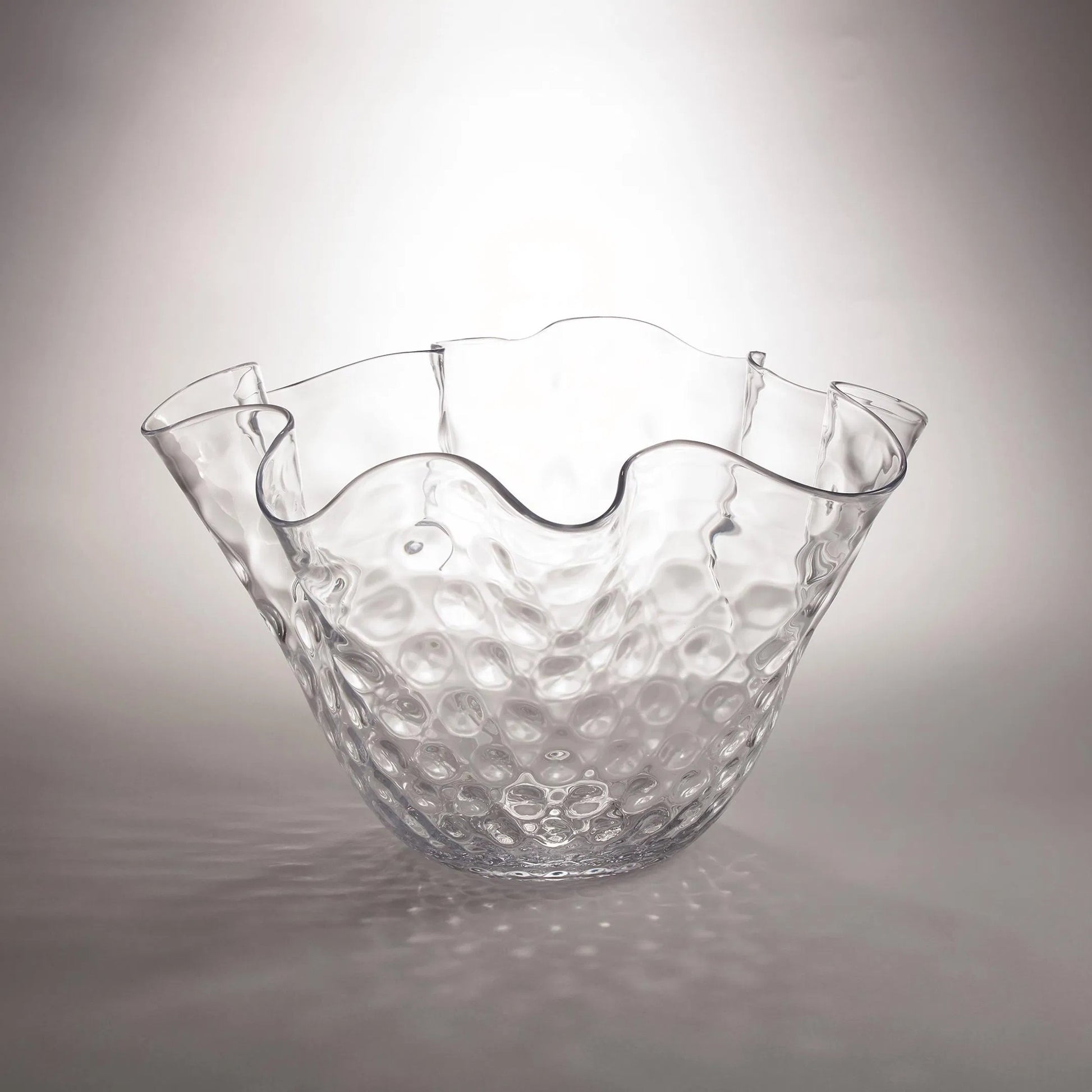 Honeycomb Optic Wavy Bowl by Global Views. Made from glass in a modern style.