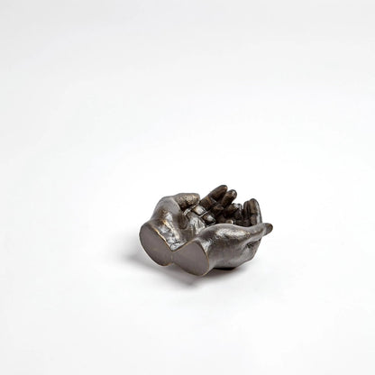 Hand Bowl by Global Views in antique statuary bronze. Made from iron in a eclectic & global style.