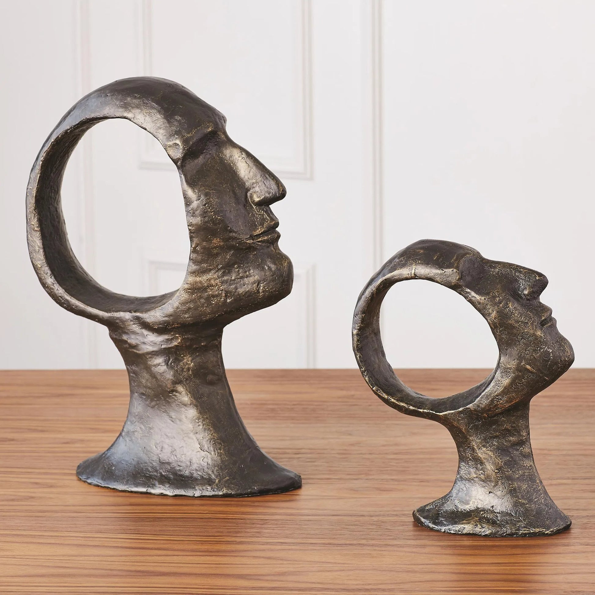 Hollow Head Man by Global Views in bronze. Made from iron in a eclectic & global style.