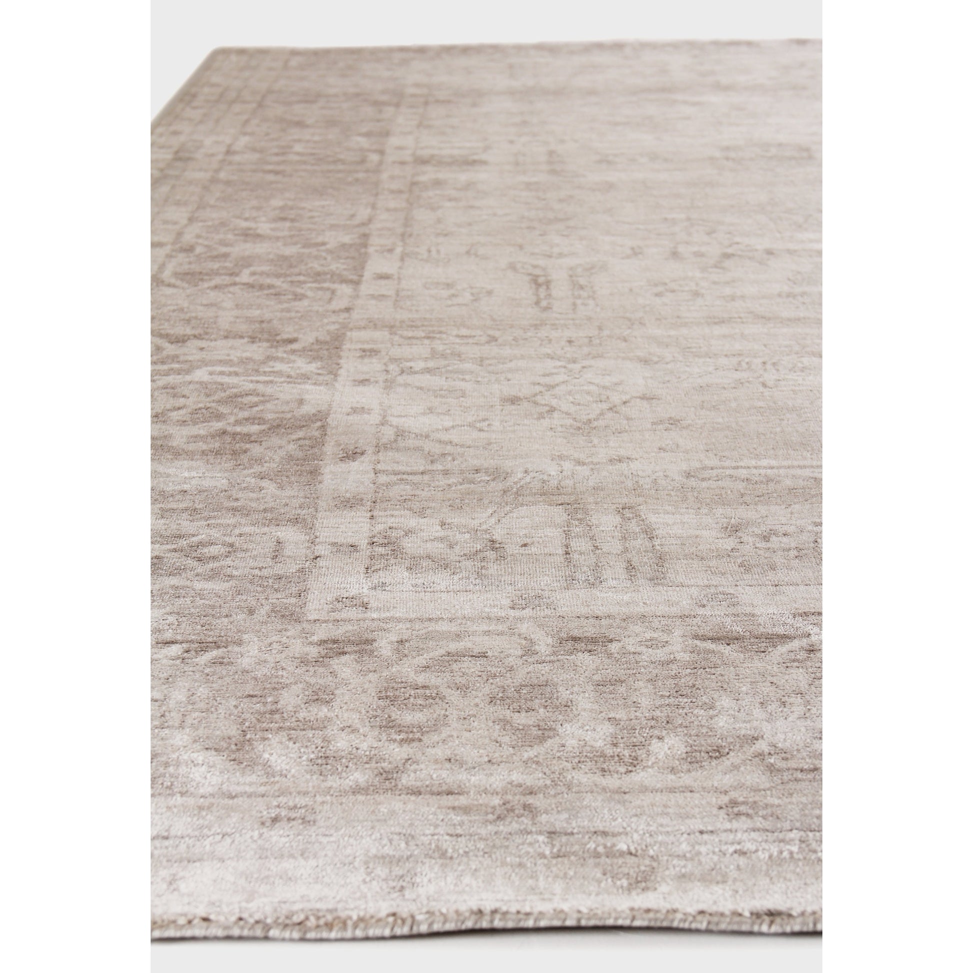 Antique'd Silk Rug by Exquisite Rugs. Made from bamboo silk in a unique style.