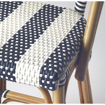 Lila Rattan Bar Stool by Butler Specialty Company in blue and blue. Made from rattan, plastic weave in a coastal style.