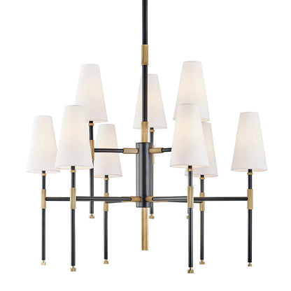 Bowery Chandelier by Hudson Valley in aged old bronze. Made from brass in a transitional style.