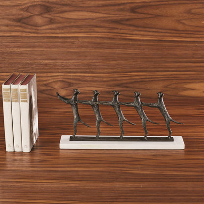 Golden Conga Line by Global Views. Made from cast brass, white marble in a eclectic & global style.