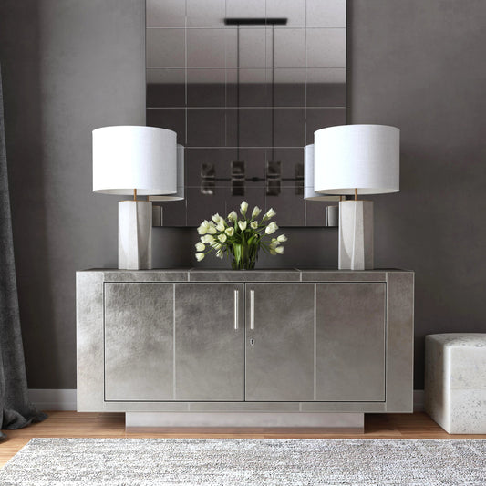 Francois Leather Sideboard by Butler Specialty Company in silver. Made from meranti wood solids, mdf, leather, polysuede cloth, stainless steel in a modern style.
