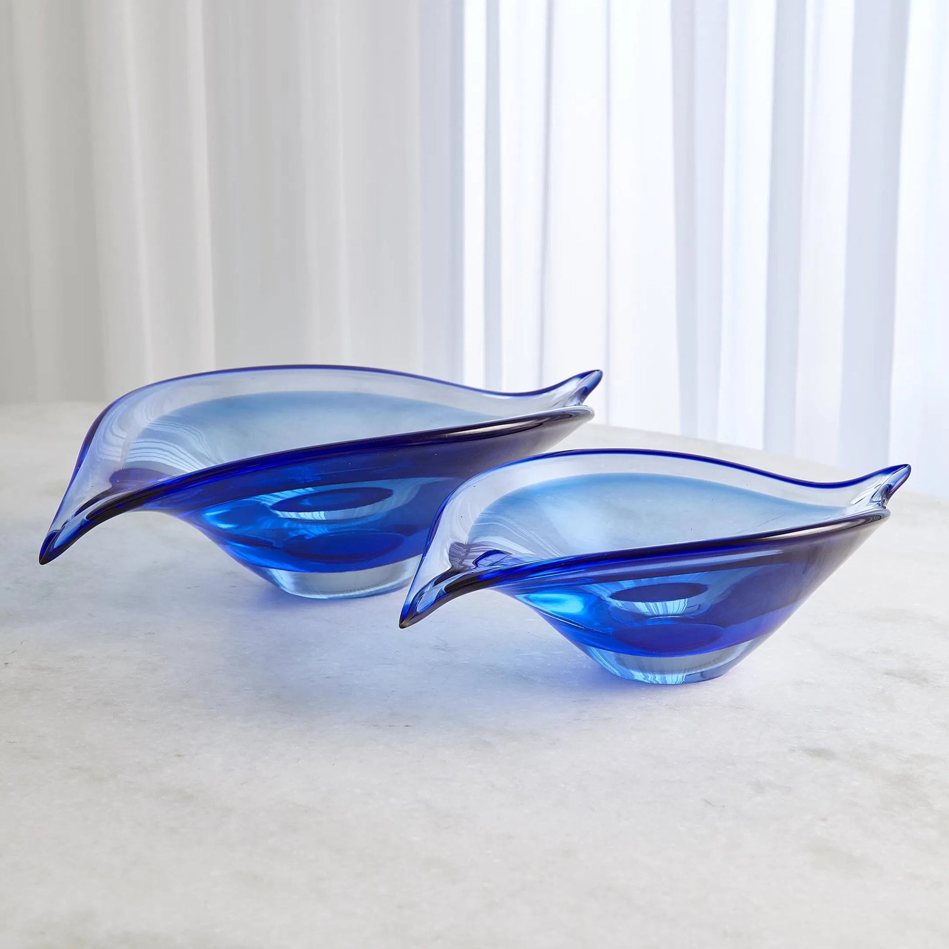 Bent Leaf Bowl by Global Views. Made from art glass in a unique style.