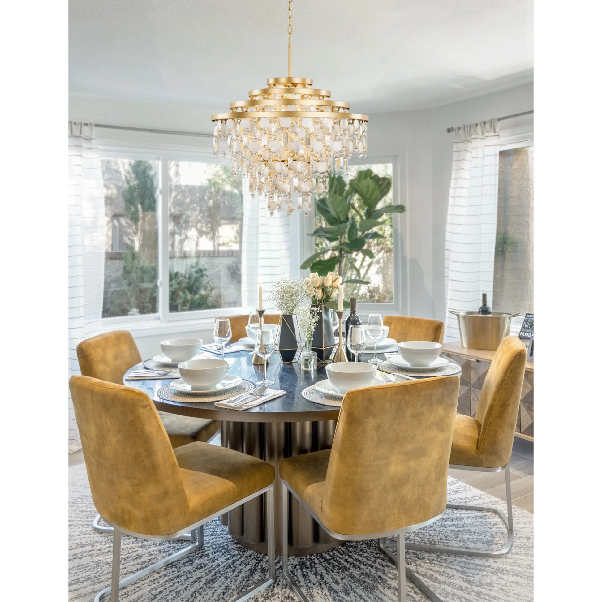 Kalani Chandelier by Varaluz in french gold. Made from unique in a traditional style.