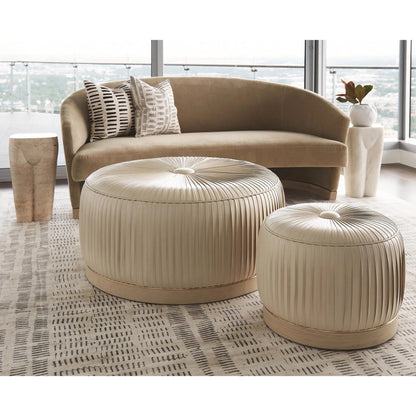 Colette Pouf by Global Views. Made from brass, leather in a modern style.