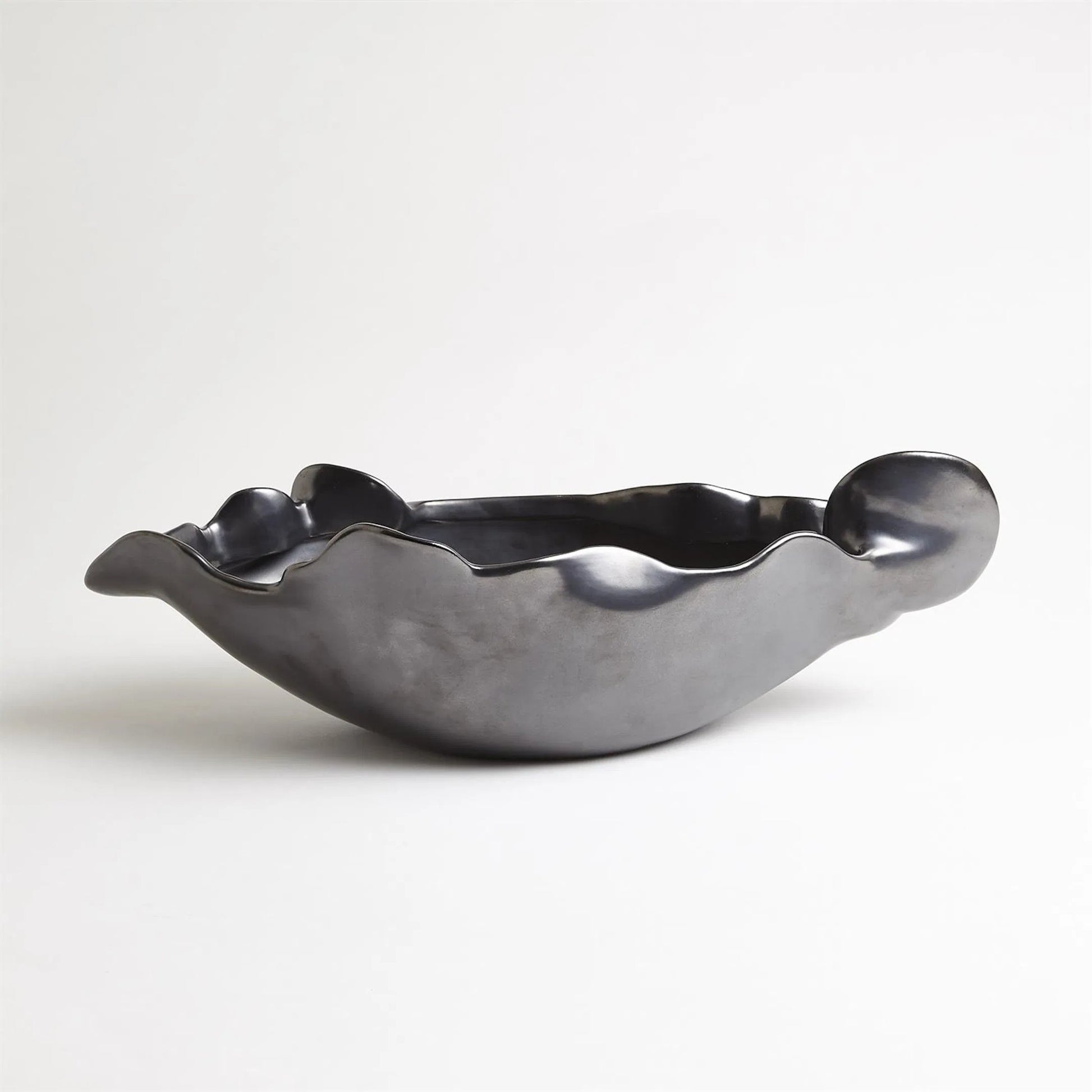 Free Form Organic Bowl by Global Views. Made from ceramic in a modern style.