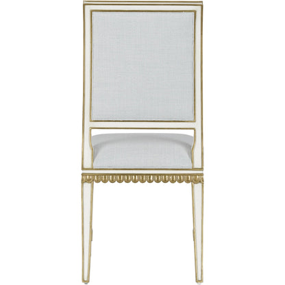 Ines Chair by Currey and Company in mixology moonstone and ivory, antique gold. Made from mahogany in a transitional style.