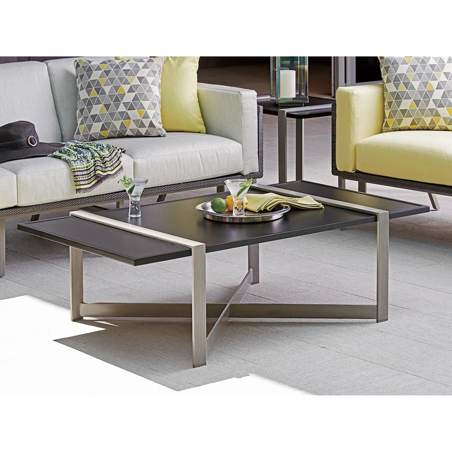 003 SI-2540692 | Lifestyle | Del Mar Rectangular Cocktail Table by Tommy Bahama Outdoor in gray. Made from aluminum, high-density laminate in a unique style.