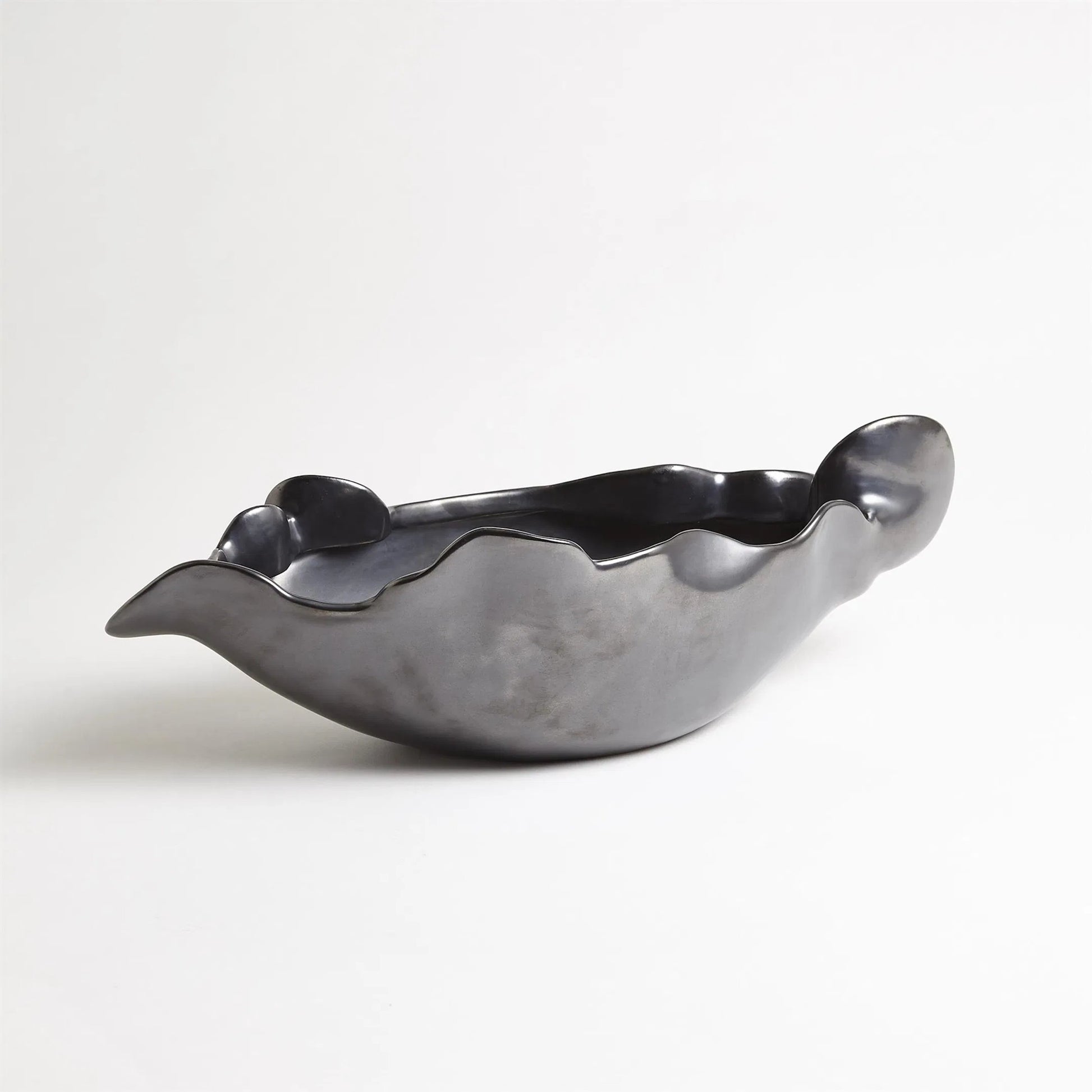 Free Form Organic Bowl by Global Views. Made from ceramic in a modern style.