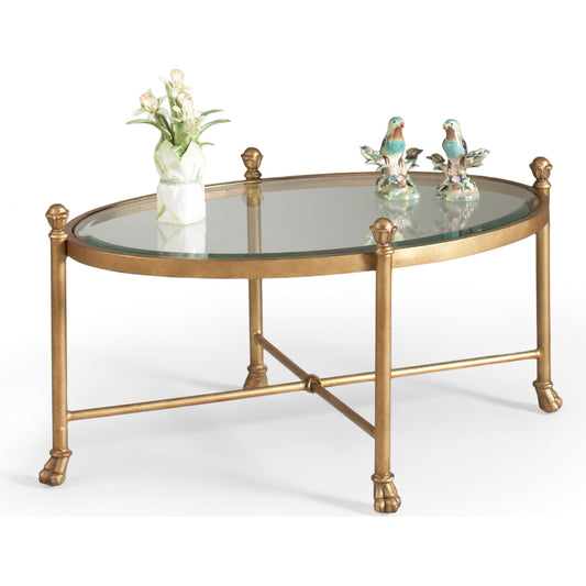 Gordon Oval Cocktail Table by Chelsea House in gold. Made from metal, glass in a traditional style.