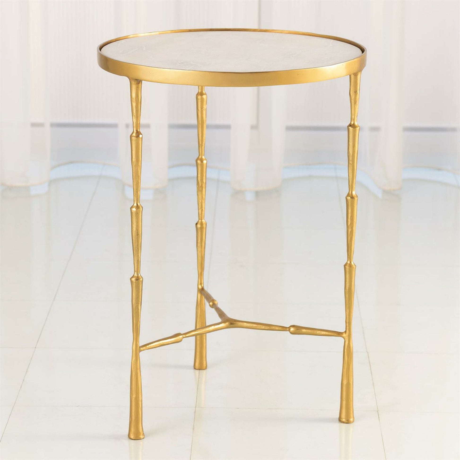 Spike Accent Table by Global Views in antique brass with white marble. Made from iron, 15 mm thick white marble in a eclectic & global style.