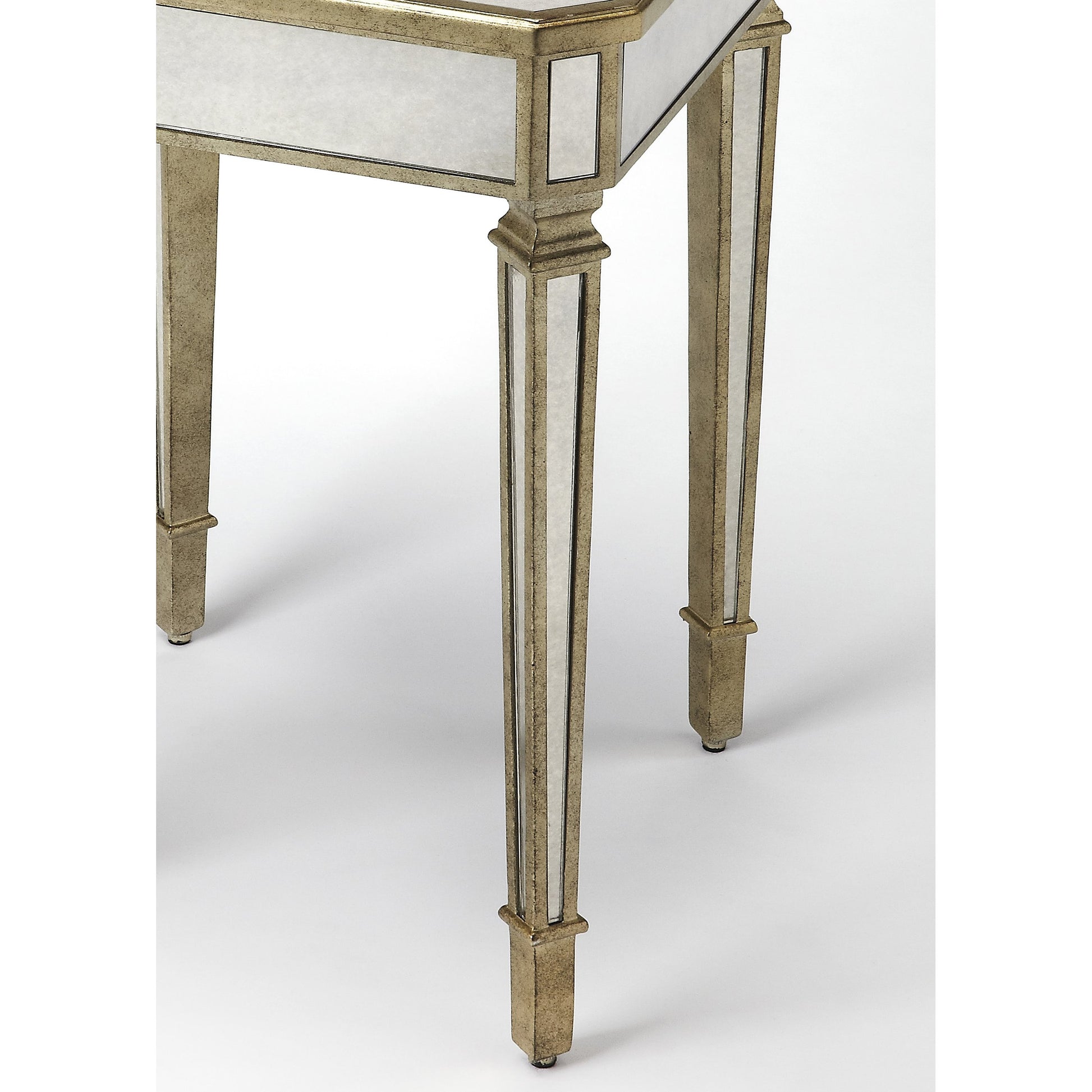 Celeste Mirrored End Table by Butler Specialty Company in silver and mirror. Made from poplar hardwood solids, mdf in a modern style.