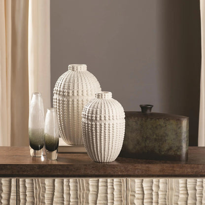 Nail Head Vase by Global Views in rustic white. Made from ceramic in a coastal style.
