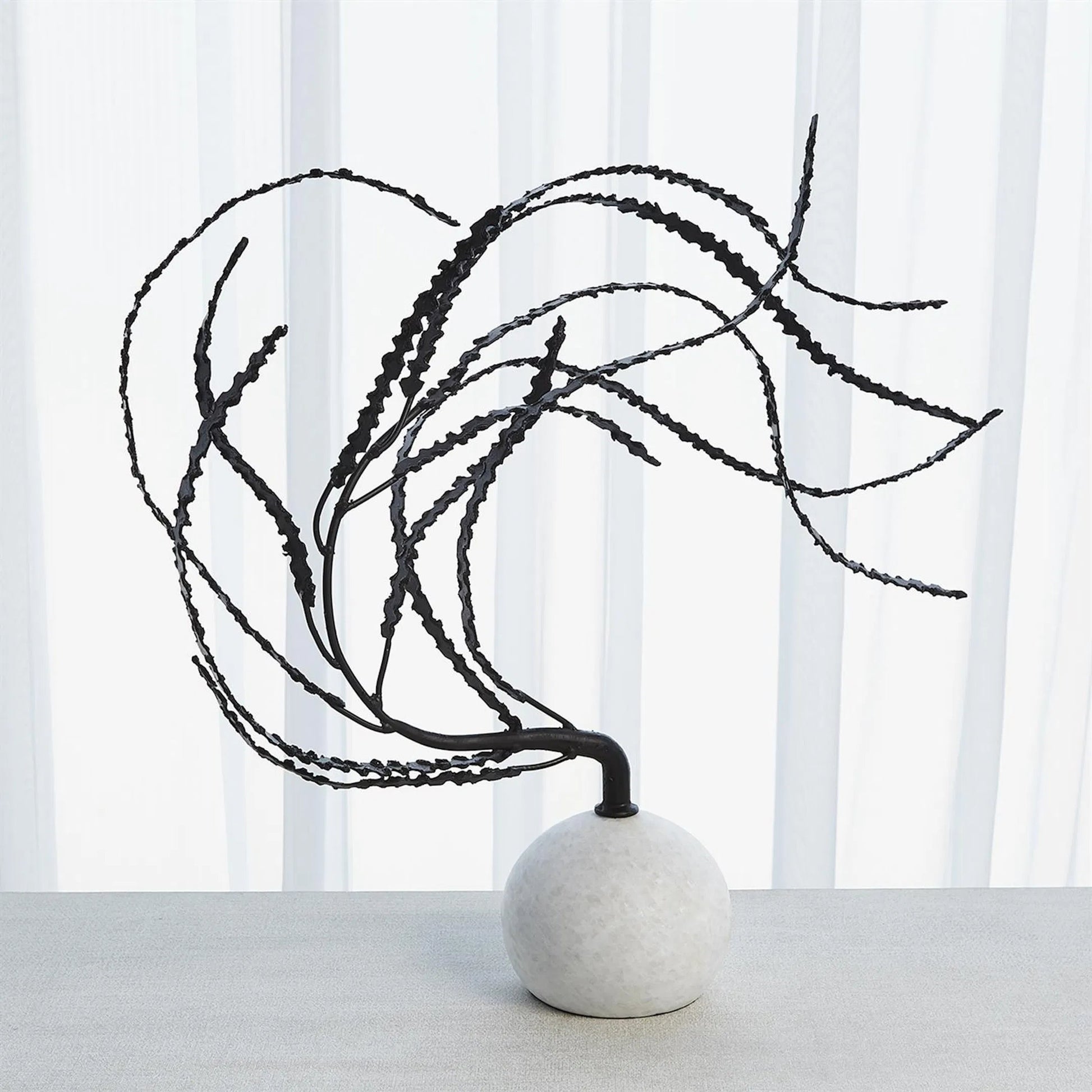 Thistle Sculpture by Global Views in black. Made from iron, white marble in a eclectic & global style.