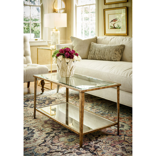 Carson Cocktail Table by Chelsea House in gold. Made from iron, glass in a transitional style.
