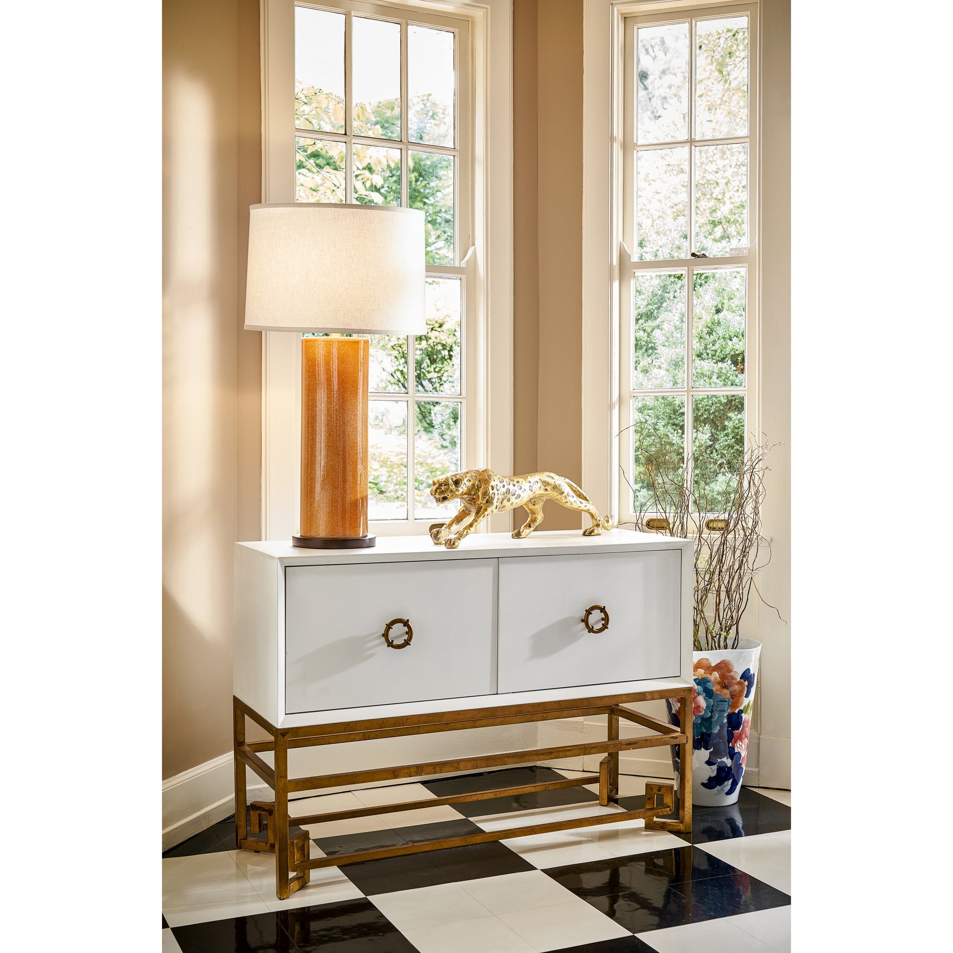 Decker Cabinet by Chelsea House in black, gold leaf. Made from gold leaf finishes in a transitional style.