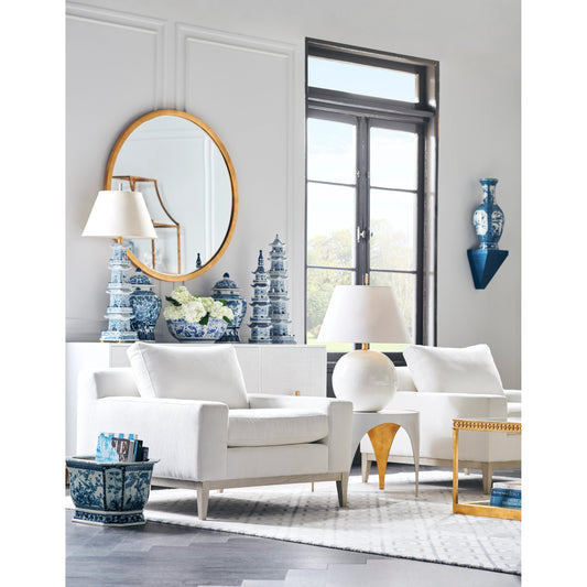 Round Mirror by Chelsea House in antique gold leaf, beveled. Made from unique in a transitional style.