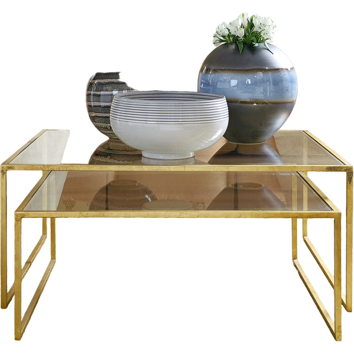 002 SR-383377 | Lifestyle | Nested Cocktail Tables by Chelsea House in gold leaf, clear. Made from gold leaf finish - iron in a modern style.